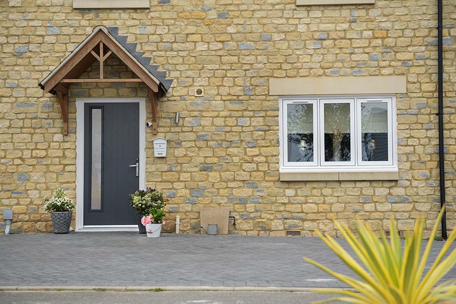 Dual anthracite grey classic Paris composite door with flush windows