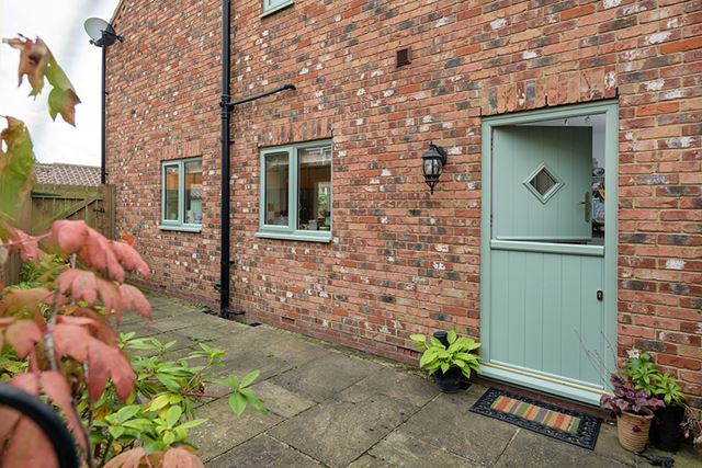 Sage green Grasmere cottage contemporary stable door