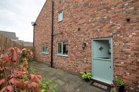 Grasmere composite stable door in sage green with sage green casement windows