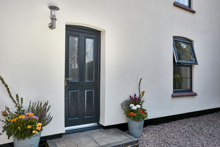 Anthracite top opening casment windows georgian bars  andtraditional composite door