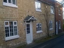 Before new Cream external composite front door and windows Anglian Home UK