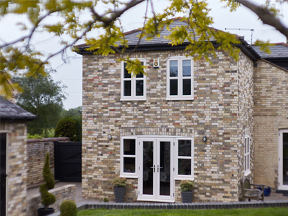 Cream French doors with side windows Anglian Home UK