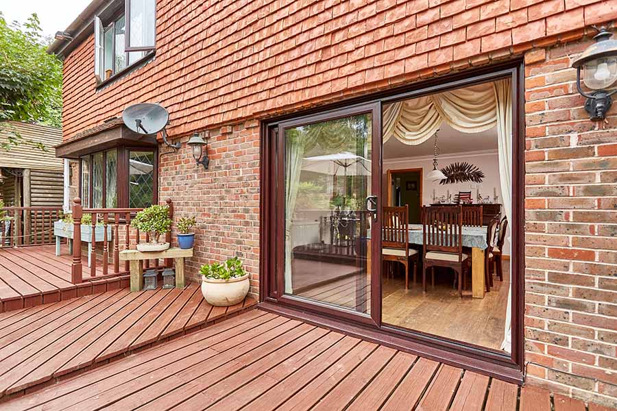 Dark woodgrain uPVC sliding patio door