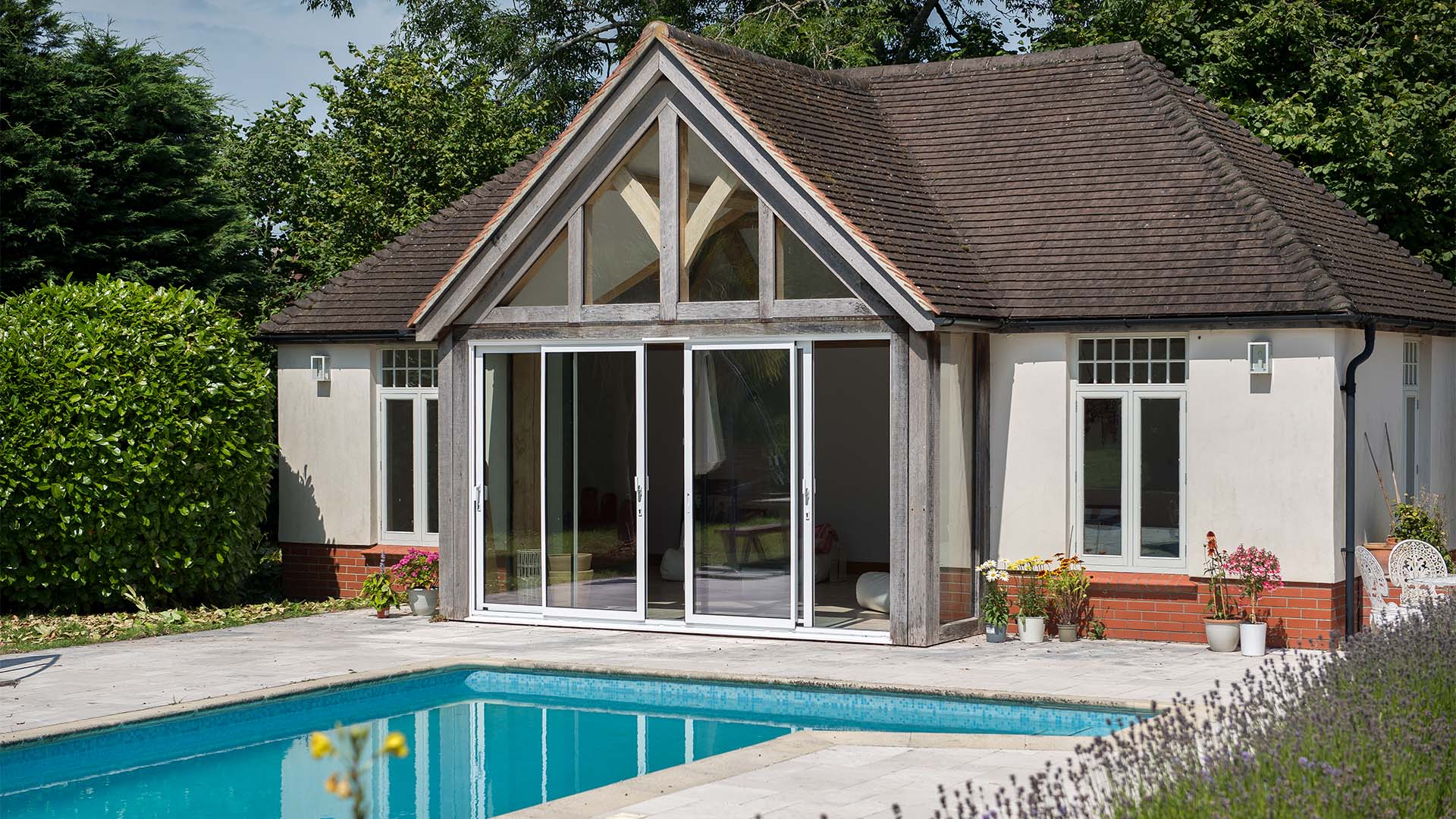 White patio doors back house with pool