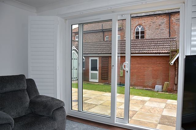 White uPVC sliding patio door interior in open position