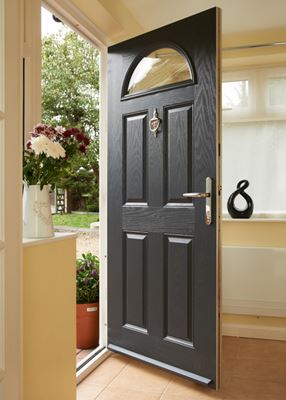 Traditional composite front door finished in Anthracite Grey from the Anglian door range