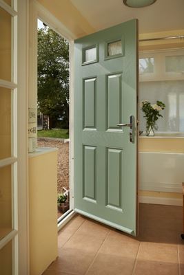 Traditional composite front door finished in Sage Green from the Anglian composite doors range