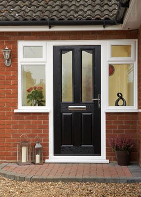 Jet Black composite front door with chrome handle and letterplate and Pelerine obscure glass from the Anglian traditional composite door range