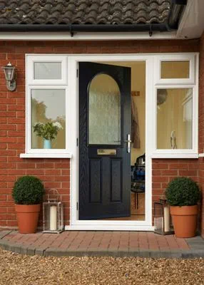 Steel Blue composite front door with gold handle and letterplate and Cotswold obscure glass from the Anglian traditional composite door range