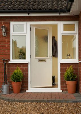 White composite front door half glazed Minister glass with chrome handle and letterplate from the Anglian cottage composite door range
