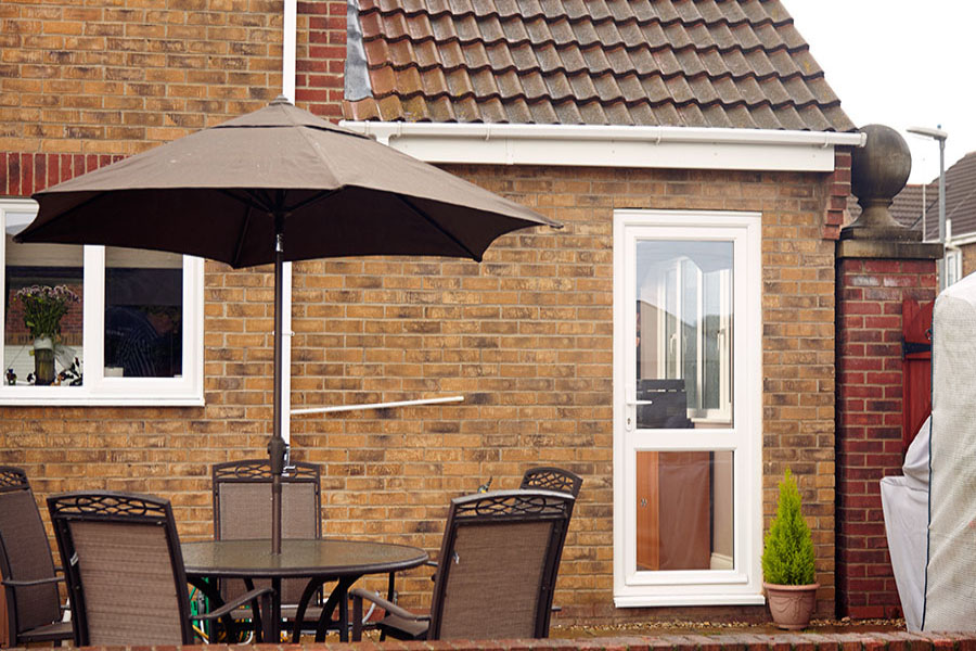 White uPVC traditional fully glazed back door with clear glass from the Anglian back door range