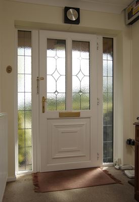 Interior view of White UPVC front door with lead bars and obscure glass from Anglian Home Improvements