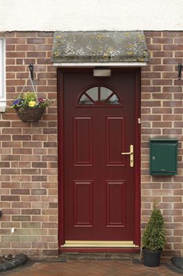 Wooden front door finished in Burgundy Red from the Anglian timber front door range