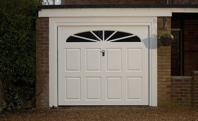 'Maine' one piece GRP garage door finished in white