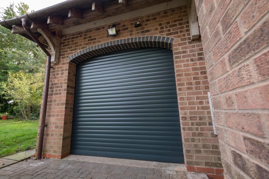 Modern electric aluminium roller garage door from Anglian Home Improvements