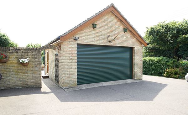 Double aluminium roller garage door in Fir Green from the Anglian garage doors range