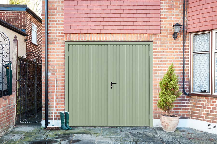 Sage green steel side hinge garage doors