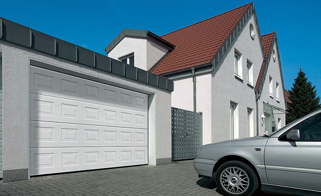 White steel sectional double garage door wide in Georgian style with four panels from the Anglian garage doors range