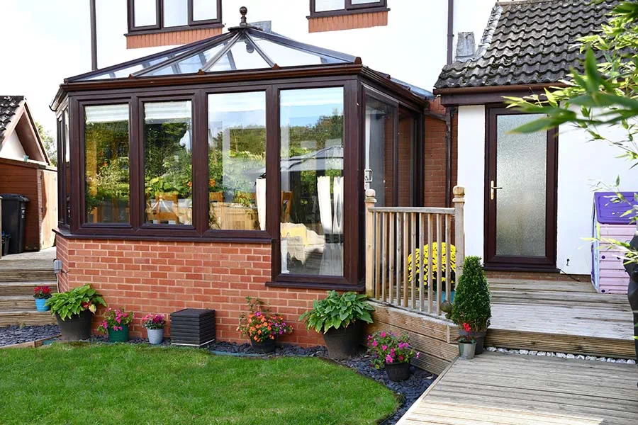 small dark woodgrain Edwardian conservatory