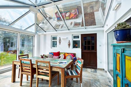 Dual Anthracite grey uPVC Elizabethan conservatory with bifold doors interior