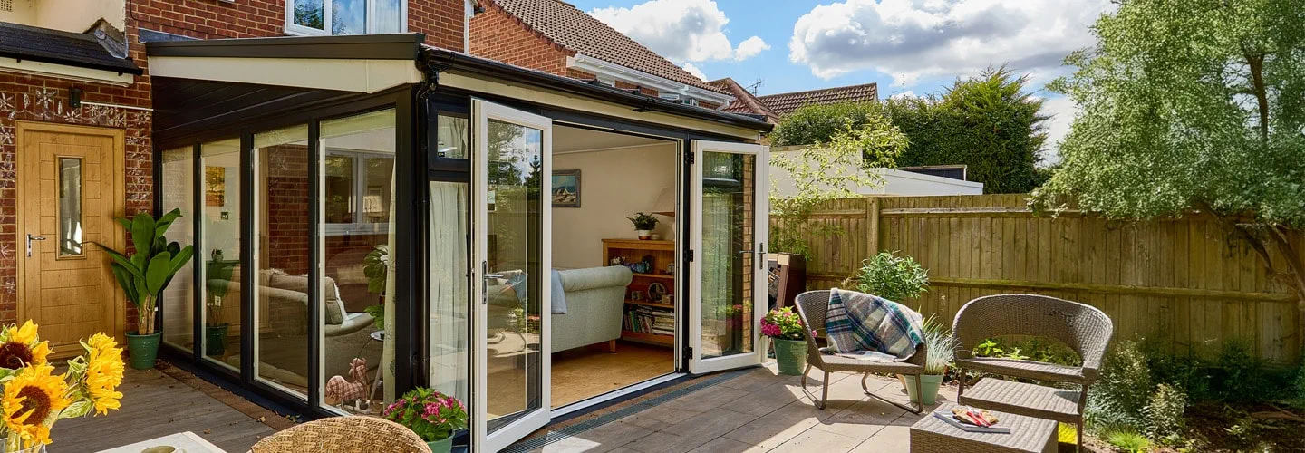 Replica tiled roof dual anthracite grey extension with French doors