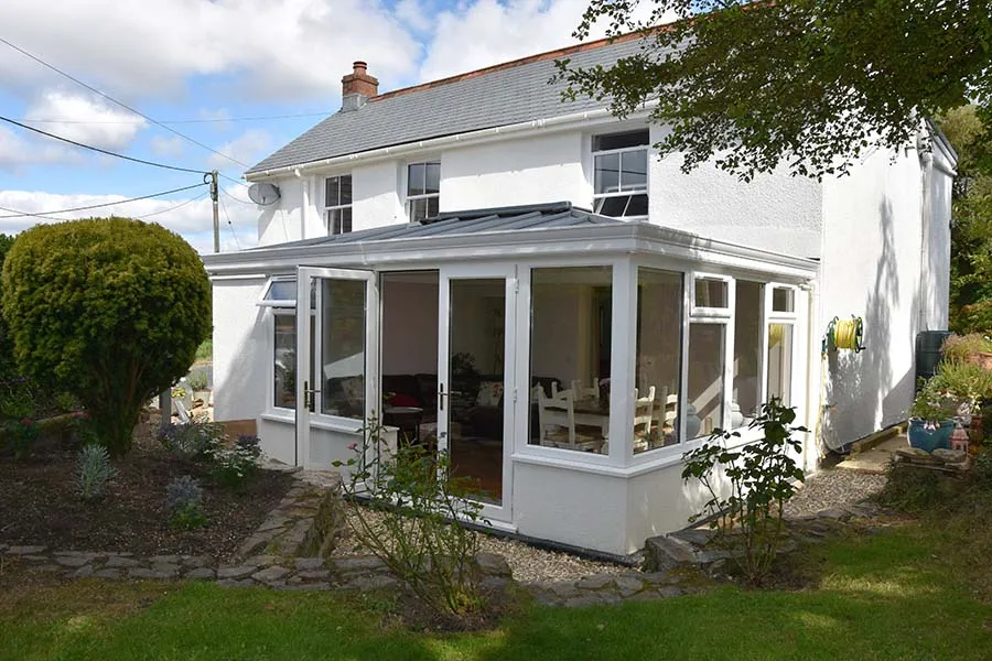 Solid panel roof extension with uPVC French doors