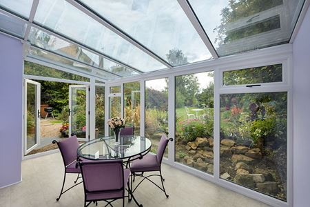 Dual sage green uPVC lean to with French doors