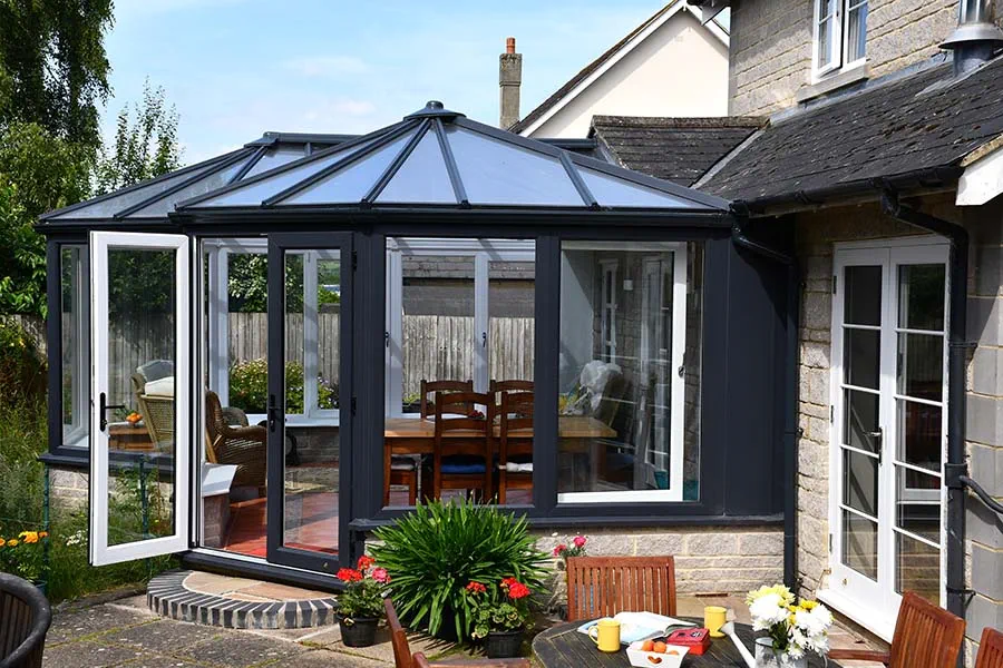 Dual anthracite grey Edwardian P-shaped harmony conservatory