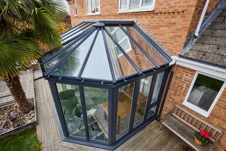 Dual Anthracite grey P shaped conservatory glass roof close up