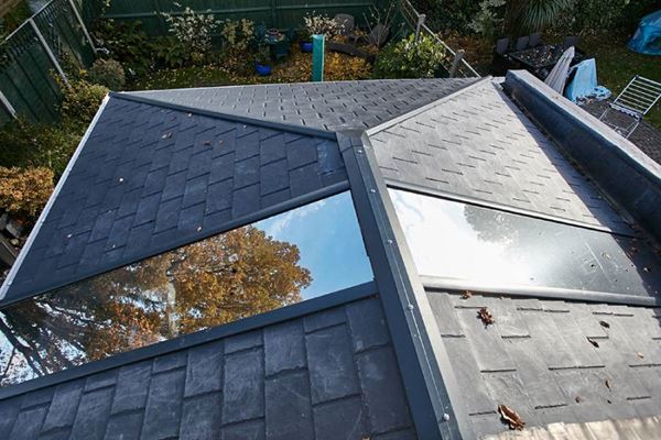Aerial view of replica tiled slate solid roof conservatory with two glass panels from the Anglian solid roof conservatory range