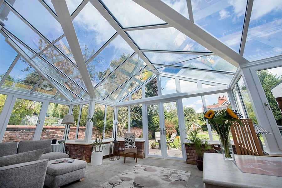 White uPVC T Shaped Harmony conservatory with French doors and tilt and turn windows interior