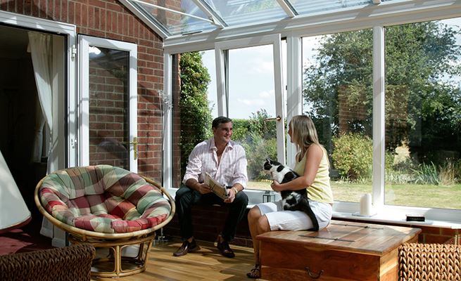 Victorian UPVC conservatory finished in White Knight with tilt and turn windows from the Anglian traditional conservatory range