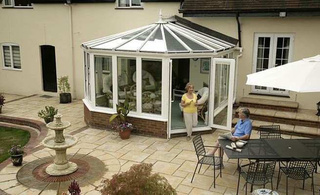 UPVC Victorian conservatory in White Knight with tilt and turn windows and French doors from Anglian Home Improvements
