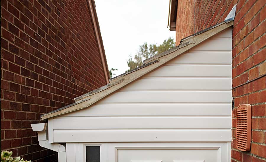White uPVC porch cladding Anglian Home Improvements