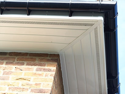 Anglian White uPVC fascia board and black guttering