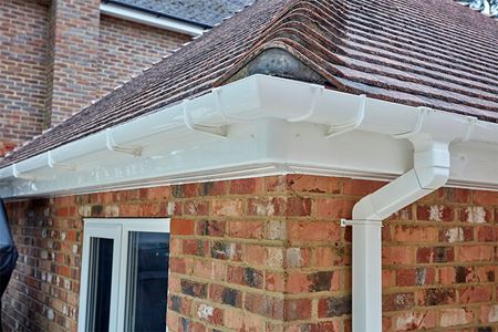 White uPVC square guttering corner view