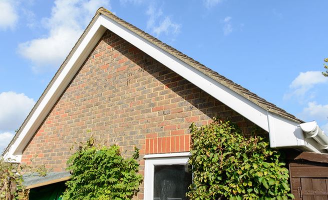 Gable end uPVC bargeboards in white from the Anglian bargeboard range