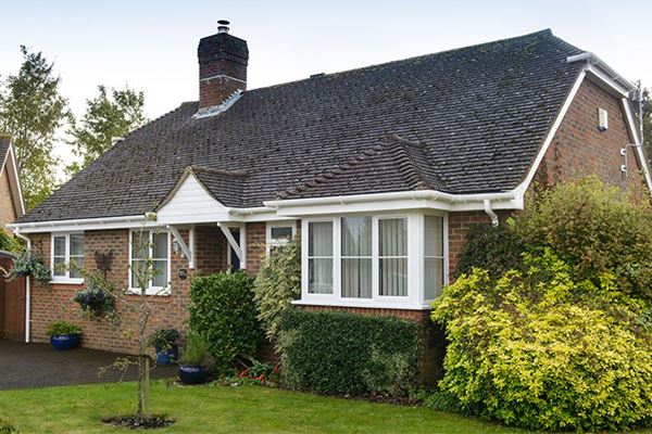 Whole home renovation of White uPVC guttering and downpipes on a bungalow from the Anglian guttering range
