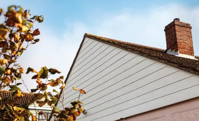 Anglian embossed featheredge cladding in white