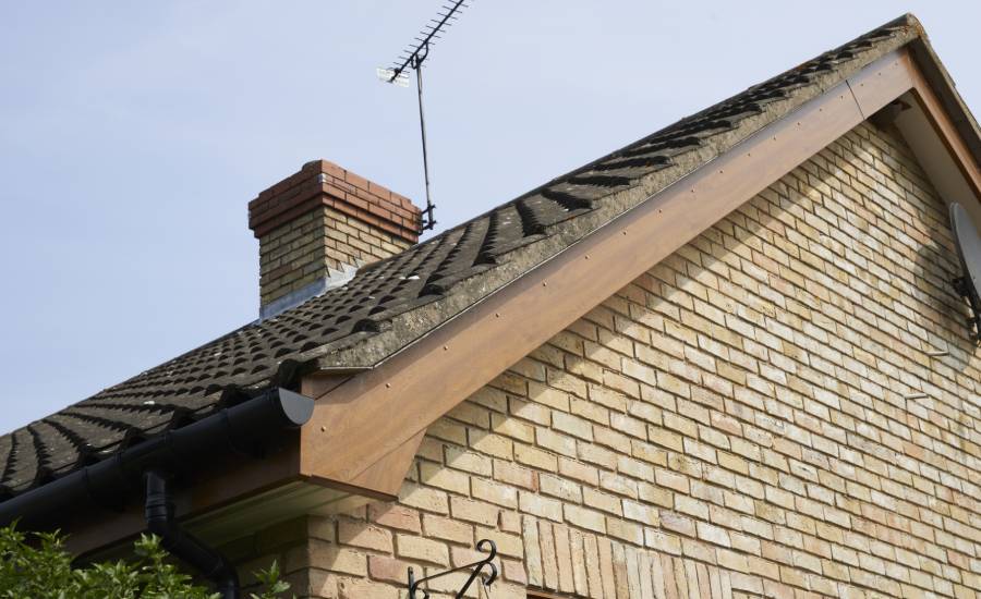 Brown bargeboard in golden oak woodgrain from Anglian Home UK 