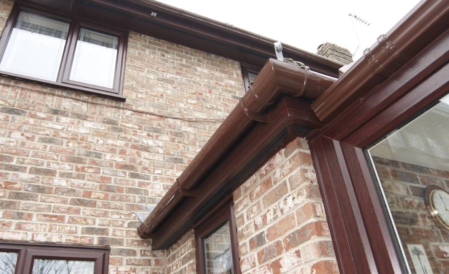 Brown guttering fascia and soffits from Anglian Home UK