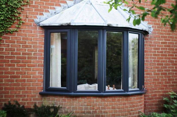 Anthracite Grey bay window in uPVC casement style from Anglian Home Improvements