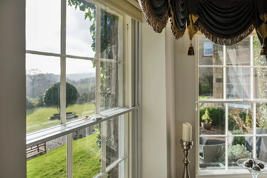 Wood sliding sash window with secondary glazing after