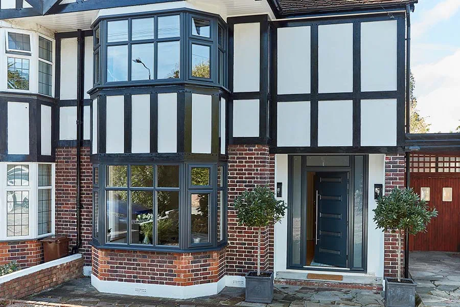 Anthracite grey uPVC bay casement windows with front door