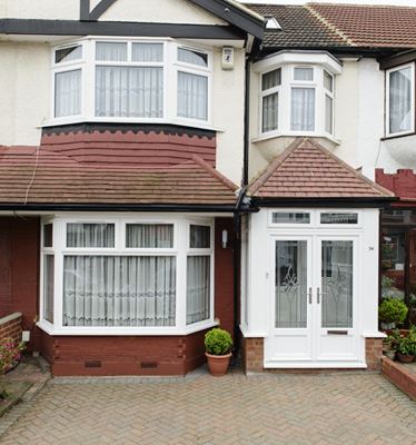 White uPVC bay front window with top hung casement windows from the Anglian bay window range