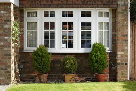 White uPVC bay window with georgian inserts