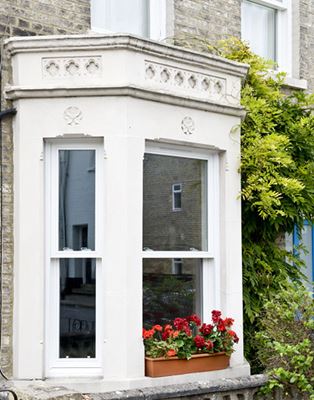 Traditional white wooden Victorian sash bay window from the Anglian sash bay window range