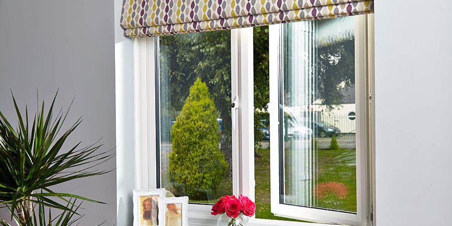 White UPVC casement windows triple glazed with white window handles from the Anglian triple glazing window range