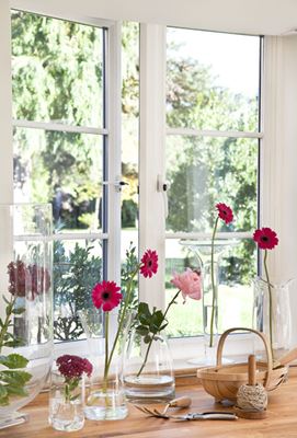 Double glazed UPVC casement window finished in White with cottage bars from the Anglian casement window range