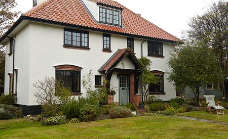 Detached country style property featuring Timber windows & doors